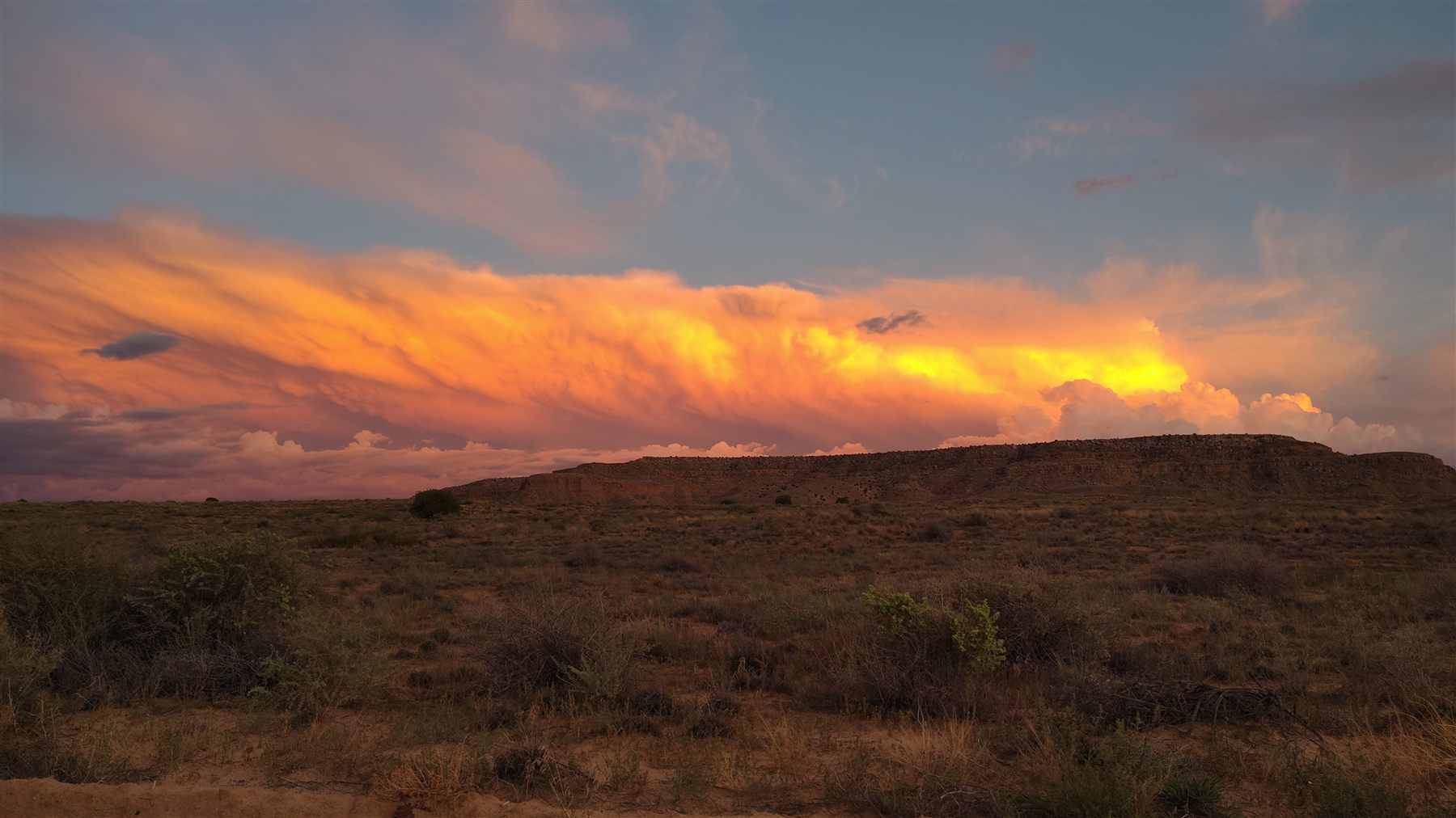 A fiery sunset over a desert mesa in Northern Arizona